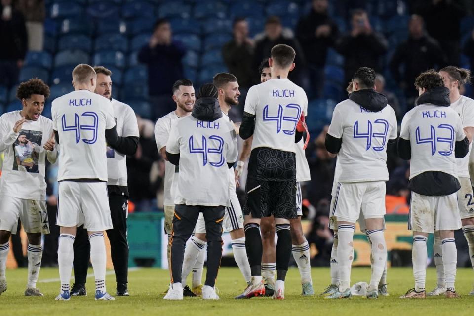 Leeds players donned T-shirts in tribute to Mateusz Klich, centre, after their 2-2 home draw against West Ham (Danny Lason/PA) (PA Wire)