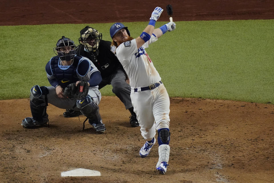 Los Angeles Dodgers' Justin Turner flies out against the Tampa Bay Rays during the sixth inning against the Tampa Bay Rays a baseball World Series Game 6 Tuesday, Oct. 27, 2020, in Arlington, Texas. (AP Photo/Sue Ogrocki)