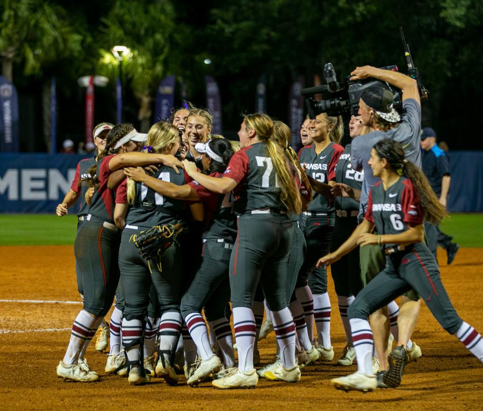 Arkansas celebrates its 4-1 win over Florida in the semifinals of the SEC Tournament, Friday, May 13, 2022, at Katie Seashole Pressly Stadium in Gainesville, Florida. The Razorbacks move on to the championship game. [Cyndi Chambers/ Special to the Sun] 2022