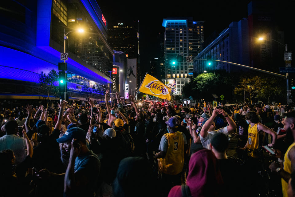  Lakers fans celebrate in front of the Staples Center after winning the 2020 NBA Finals