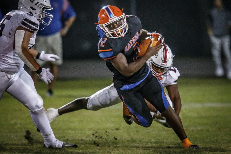 Second half action of Florida High School Athletic Association boys football action between the host Palm Beach Central High School Broncos and the Palm Beach Gardens Community High School Gators in Wellington, Fla., on October 21, 2022.