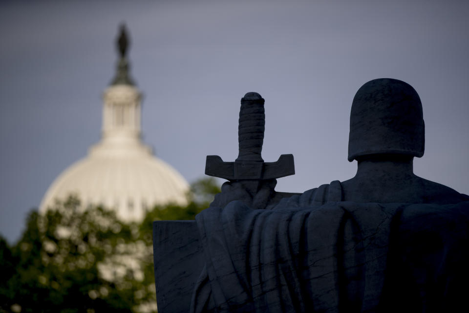 FILE - In this May 4, 2020, file photo the Dome of the U.S. Capitol Building is visible from the steps of the the Supreme Court in Washington. (AP Photo/Andrew Harnik, File)