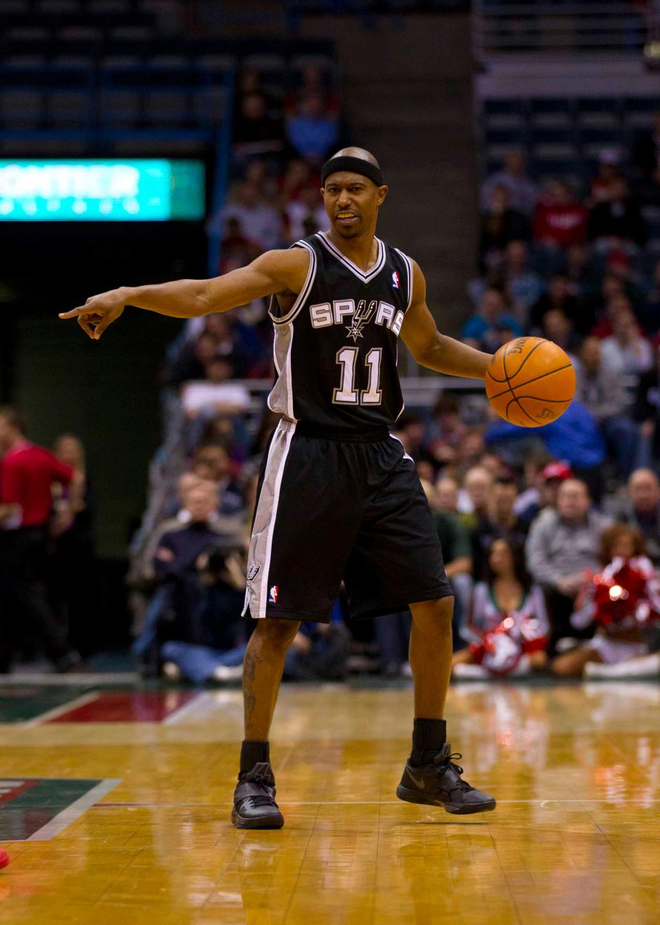 T.J. Ford directs the Spurs' offense during a 2012 game. “They have always treated me like family. And they continue to treat me like family,” Ford said. “San Antonio (and) Austin, Texas, is one big, huge family.”