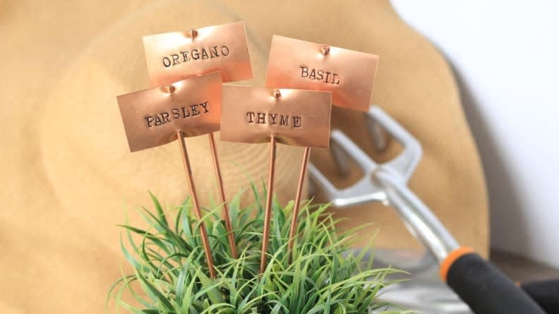 Keep your garden beds organized with these copper stakes.