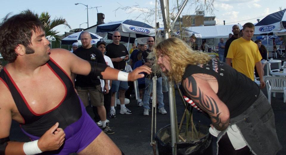 Spring Lake Heights native professional wrestler Balls Mahoney (right), shown in 2001 during a match against Bilvis Wesley for EWA at the Stone Pony in Asbury Park.
