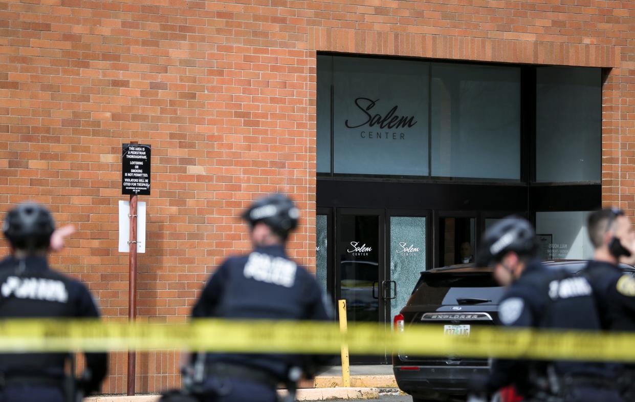 Salem Police set a perimeter around Salem Center after a shooting took place in March 2022.