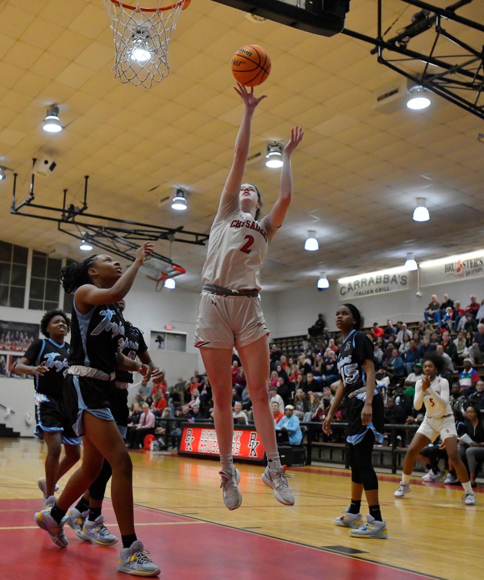 Bishop Kenny forward Clare Coyle goes up for two points in the regional basketball playoffs against Ribault.