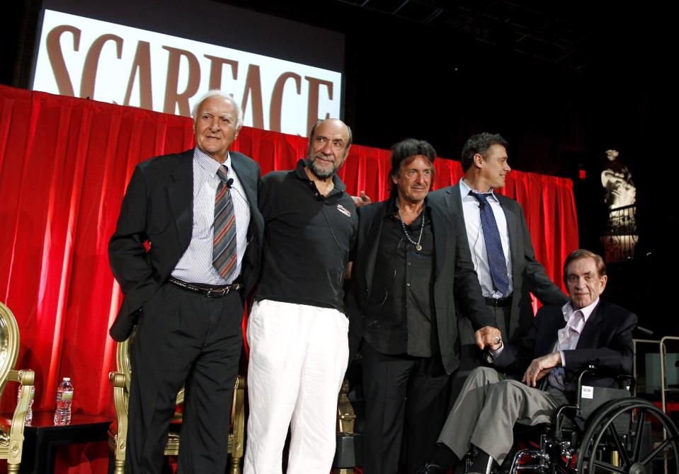 FILE - In this Aug. 23, 2011 file photo, Robert Loggia, from left, F. Murray Abraham, Al Pacino, Steven Bauer, and Martin Bregman pose together onstage during the "Scarface" Legacy Celebration Event in Los Angeles. Loggia, who played drug lords and mobsters and danced with Tom Hanks in "Big," has died at age 85. His wife Aubrey Loggia said Loggia died Friday, Dec. 4, 2015, at his home in Los Angeles after a five year battle with Alzheimer's. (AP Photo/Matt Sayles, File)