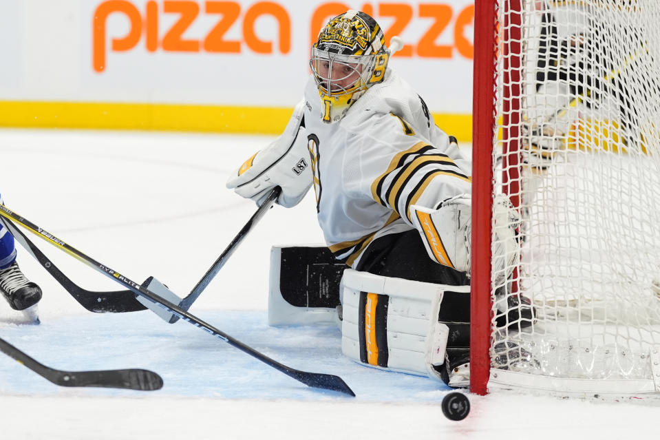 Boston Bruins goaltender Jeremy Swayman (1) covers the post as the puck goes wide against the Toronto Maple Leafs during the second period of an NHL hockey game in Toronto, Monday, March 4, 2024. (Frank Gunn/The Canadian Press via AP)