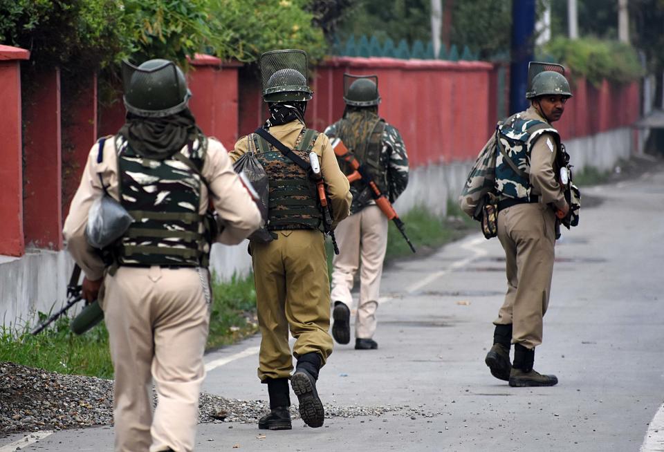 Indian soldiers patrol the deserted street during the official celebration of India's Independence day in Srinagar,Kashmir on August 15, 2019. Restrictions continues as the government has suspended cellular network ,internet services,schools and colleges across the Kashmir valley are shut to prevent protest and demonstrations.People in the valley have collected stock essentials because of the fear of an offensive from the Indian forces after the Indian governemnt abrogated the controversial Article 370. (Photo by Faisal Khan/NurPhoto via Getty Images)