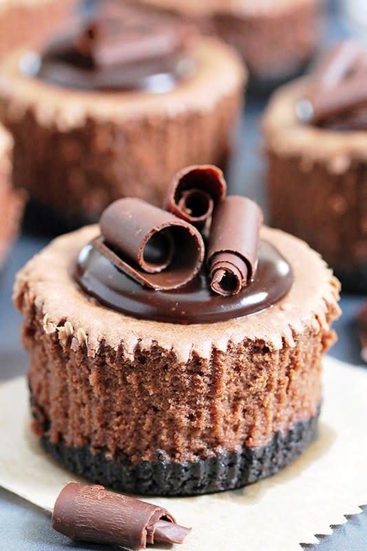 <p>Sweet Spicy Kitchen</p><p>This creamy, rich cheesecake with full chocolate taste and Oreo layer, topped with chocolate ganache and formed as mini cheesecakes, will be loved by all the chocolate fans.</p><p><strong>Get the recipe: <a href="https://www.sweetspicykitchen.com/cheesecake-pie/chocolate-mini-cheesecake-with-oreo-crust/" rel="nofollow noopener" target="_blank" data-ylk="slk:Chocolate Mini Cheesecake with Oreo Crust;elm:context_link;itc:0;sec:content-canvas" class="link ">Chocolate Mini Cheesecake with Oreo Crust</a></strong></p>