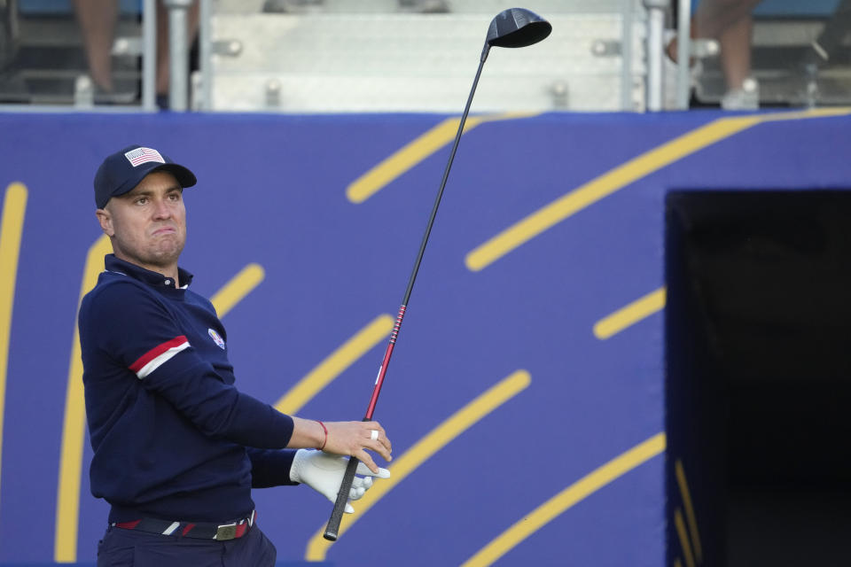 United States' Justin Thomas plays his tee shot of the 1st tee during his morning Foursomes match at the Ryder Cup golf tournament at the Marco Simone Golf Club in Guidonia Montecelio, Italy, Saturday, Sept. 30, 2023. (AP Photo/Andrew Medichini)