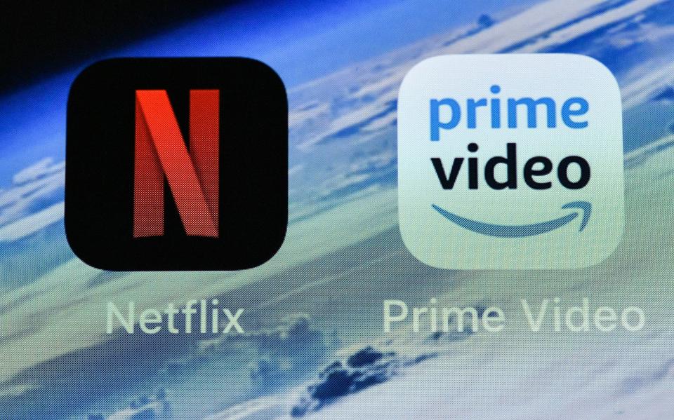 The icons of streaming services Netflix and AmazonPrime Video are pictured on an iPhone on in Gelsenkirchen, GermanyNetflix Amazon Prime Video, Gelsenkirchen, Germany - 15 Nov 2018
