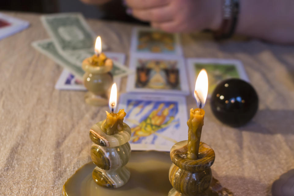 Russia, Moscow, June 11, 2021. Tarot cards on a wooden table. Magical rituals. Illustrative editorial.