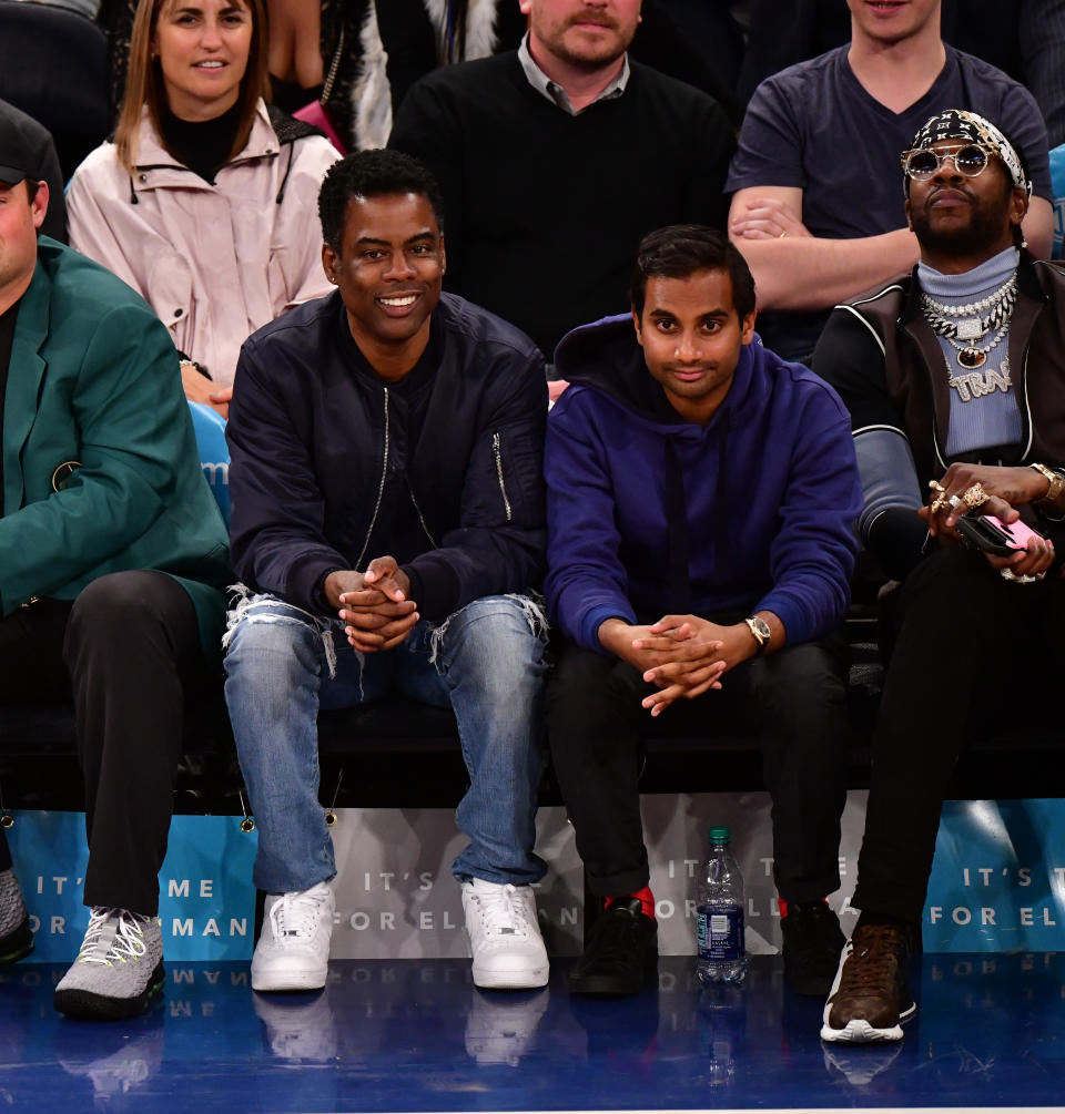 Aziz Ansari — sandwiched by Chris Rock and 2 Chainz — at the New York Knicks vs. Cleveland Cavaliers game at Madison Square Garden on April 9. (Photo: James Devaney/Getty Images)