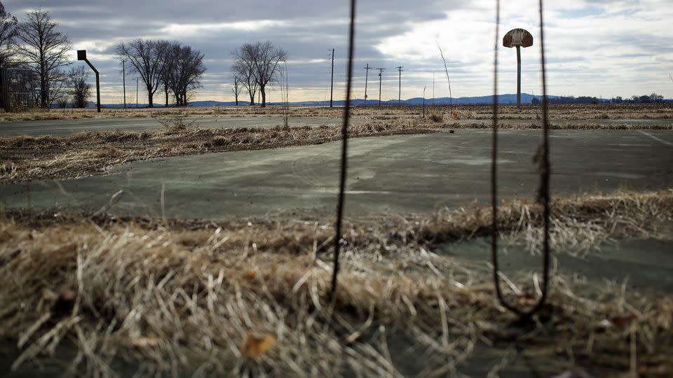 Old basketball courts at the abandoned Valmeyer High School. The entire town was moved to higher ground after a 1993 flood. - Kile Brewer/The New York Times/Redux