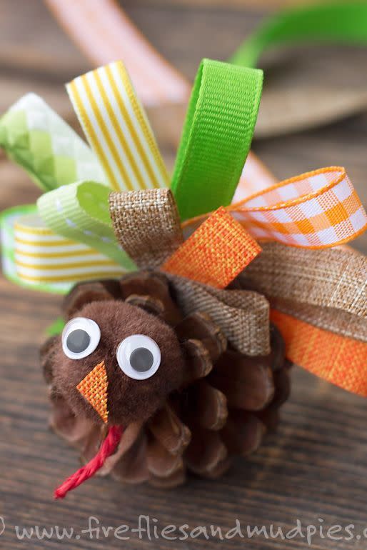 <p>Pine cones, pom-poms, and pretty ribbons, oh my! This craft's impossibly simple, but it has a big payoff. And the end result is cute enough to display proudly on your table this year. </p><p><strong>Get the tutorial at <a href="http://www.firefliesandmudpies.com/2015/10/25/scrap-ribbon-pinecone-turkeys/" rel="nofollow noopener" target="_blank" data-ylk="slk:Fireflies and Mud Pies;elm:context_link;itc:0;sec:content-canvas" class="link ">Fireflies and Mud Pies</a>.</strong></p><p><a class="link " href="https://www.amazon.com/LaRibbons-Solid-Ribbon-Colors-Package/dp/B009V35YVC?tag=syn-yahoo-20&ascsubtag=%5Bartid%7C10050.g.28638625%5Bsrc%7Cyahoo-us" rel="nofollow noopener" target="_blank" data-ylk="slk:SHOP RIBBON;elm:context_link;itc:0;sec:content-canvas">SHOP RIBBON</a> </p>