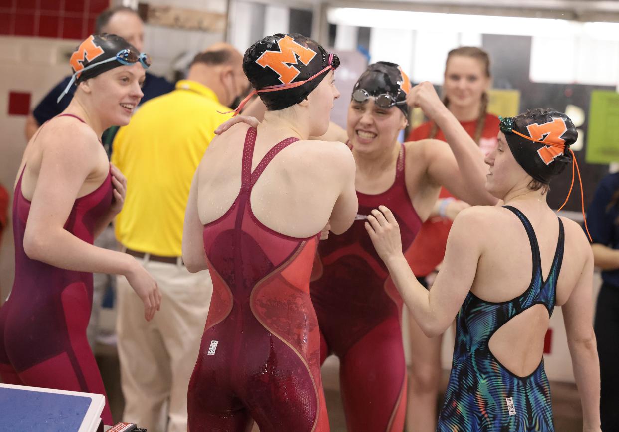 Marlington's 200-yard medley relay team celebrate its finish at the OHSAA Division II state meet at C.T. Branin Natatorium, Friday, Feb. 24, 2023.