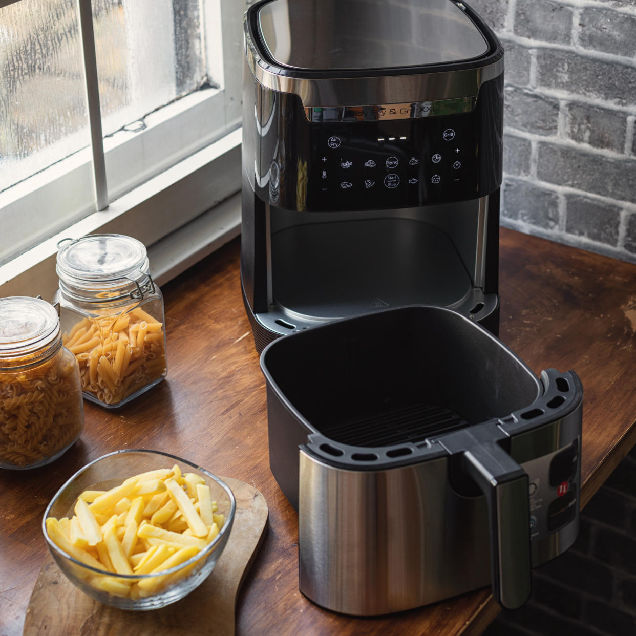  Air fryer on kitchen worktop. 