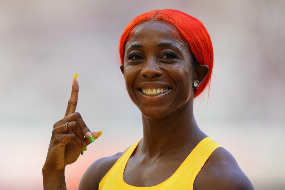 FILE - Shelly-Ann Fraser-Pryce gestures after winning a women's 100-meters heat during the World Athletics Championships in Budapest, Hungary, Sunday, Aug. 20, 2023. Jamaican great Shelly-Ann Fraser-Pryce said the Paris Games will be her fifth and final Olympics. The 37-year-old sprinter, who won two gold medals at 100 meters and another in the 4x100 relay, told Essence.com she still loves the sport but that she wants to spend more time with her husband and her 6-year-old son, Zyon. (AP Photo/Petr David Josek, File)