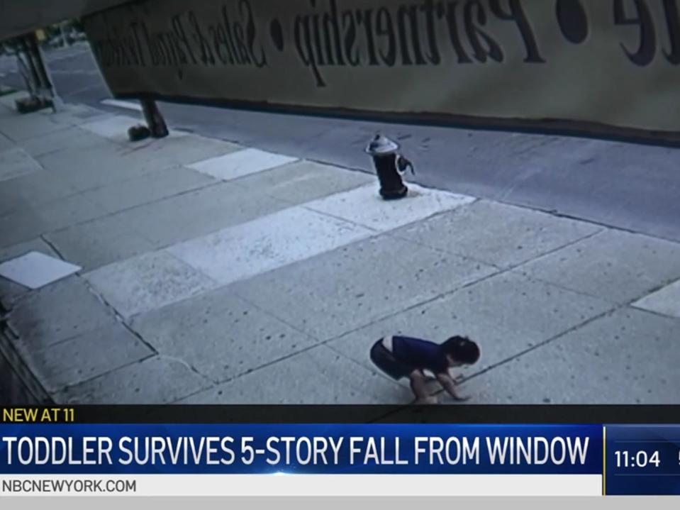 <p>CCTV footage shows toddler after falling from fifth story window in New York</p> (NBC News/NBC New York)