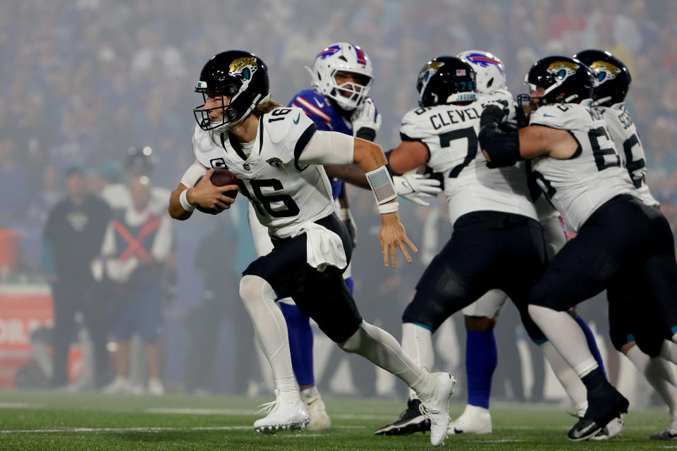 ORCHARD PARK, NEW YORK - SEPTEMBER 23: Trevor Lawrence #16 of the Jacksonville Jaguars scrambles during the first quarter against the Buffalo Bills at Highmark Stadium on September 23, 2024 in Orchard Park, New York. (Photo by Timothy T Ludwig/Getty Images)