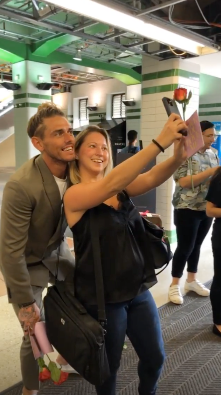 Bachelor star Timm Hanly poses for a selfie with a fan on Valentine's Day