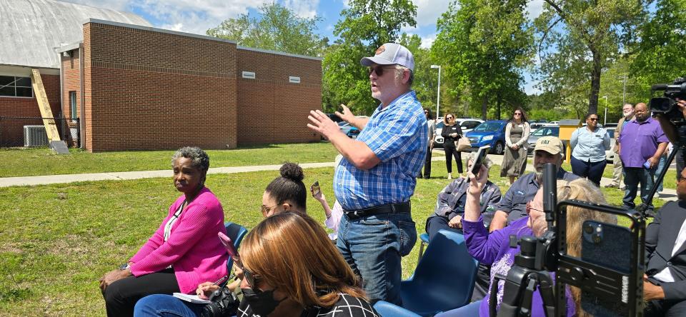 Mike Watters, a community activist who has brought increased attention to PFAS, so-called "forever chemicals," asks a question during a press conference on Friday, April 12, 2024, where officials announced a partnership between Cumberland County and the Public Works Commission. The PWC intends to extend water service to Gray's Creek in Cumberland County.