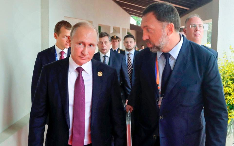Oleg Deripaska (right) with President Vladimir Putin - Mikhail Klimentyev 