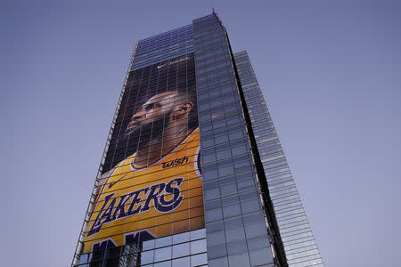 FILE PHOTO: Advertising displays of NBA basketball star LeBron James, who will make his home debut as a Los Angeles Laker October 20, can be seen in down town Los Angeles, California, U.S., October 19,2018. REUTERS/Mike Blake