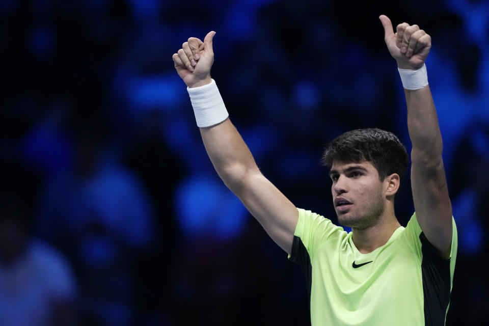 Spain's Carlos Alcaraz celebrates after winning the singles tennis match against Russia's Daniil Medvedev, of the ATP World Tour Finals at the Pala Alpitour, in Turin, Italy, Friday, Nov. 17, 2023. (AP Photo/Antonio Calanni)