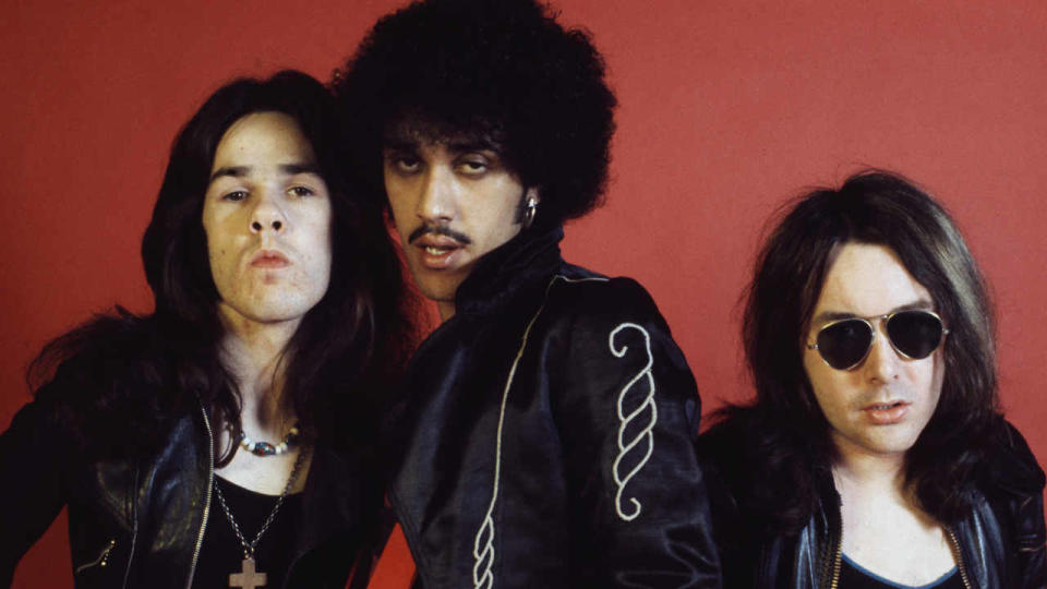 Gary Moore with Thin Lizzy’s Phil Lynott and Brian Downey in 1974