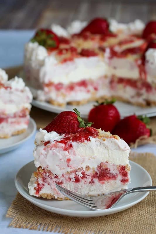 <p>My Organized Chaos</p><p>This Strawberry Shortcake Ice Cream Cake has layers of strawberry ice cream, whipped topping and a cookie crumble. Easy to make and completely delicious!</p><p><strong>Get the recipe: <a href="https://myorganizedchaos.net/strawberry-shortcake-ice-cream-cake" rel="nofollow noopener" target="_blank" data-ylk="slk:Strawberry Shortcake Ice Cream Cake;elm:context_link;itc:0;sec:content-canvas" class="link rapid-noclick-resp">Strawberry Shortcake Ice Cream Cake</a></strong></p>
