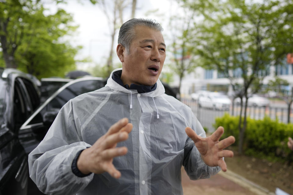 Ju Yeongbong, an official at an association of dog farmers, speaks after a rally in Seoul, South Korea, Tuesday, April 25, 2023. Dozens of dog farmers in South Korea rallied Tuesday to criticize the country’s first lady over her reported comments that support a possible ban on dog meat consumption. (AP Photo/Lee Jin-man)