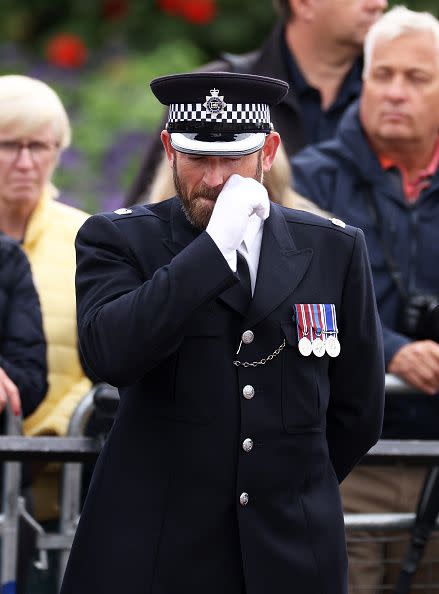 LONDON, ENGLAND - SEPTEMBER 19: A police officer is seen at Westminster Abbey for the State Funeral of Queen Elizabeth II on September 19, 2022 in London, England. Elizabeth Alexandra Mary Windsor was born in Bruton Street, Mayfair, London on 21 April 1926. She married Prince Philip in 1947 and ascended the throne of the United Kingdom and Commonwealth on 6 February 1952 after the death of her Father, King George VI. Queen Elizabeth II died at Balmoral Castle in Scotland on September 8, 2022, and is succeeded by her eldest son, King Charles III.  (Photo by Dan Kitwood/Getty Images)