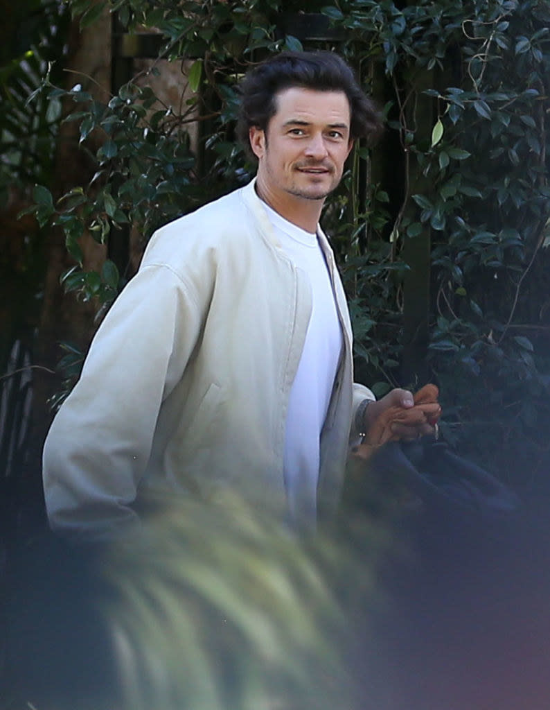 Orlando Bloom walking outside