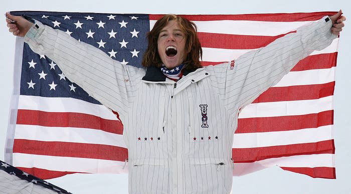 Shaun holding up an American flag