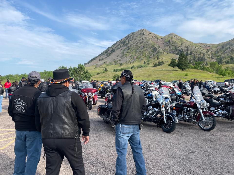 Native American bikers await the state of the Medicine Wheel Ride that began at Bear Butte State Park near Sturgis on Aug. 6.