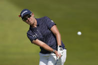 Ashleigh Buhai, of South Africa, hits a shot on the fifth hole during the final round of the LPGA Cognizant Founders Cup golf tournament, Sunday, May 14, 2023, in Clifton, N.J. (AP Photo/Seth Wenig)