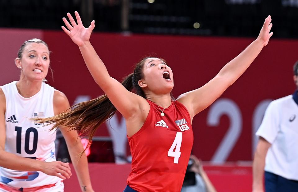 The United States' Justine Wong-Orantes celebrates a point with teammates against China.