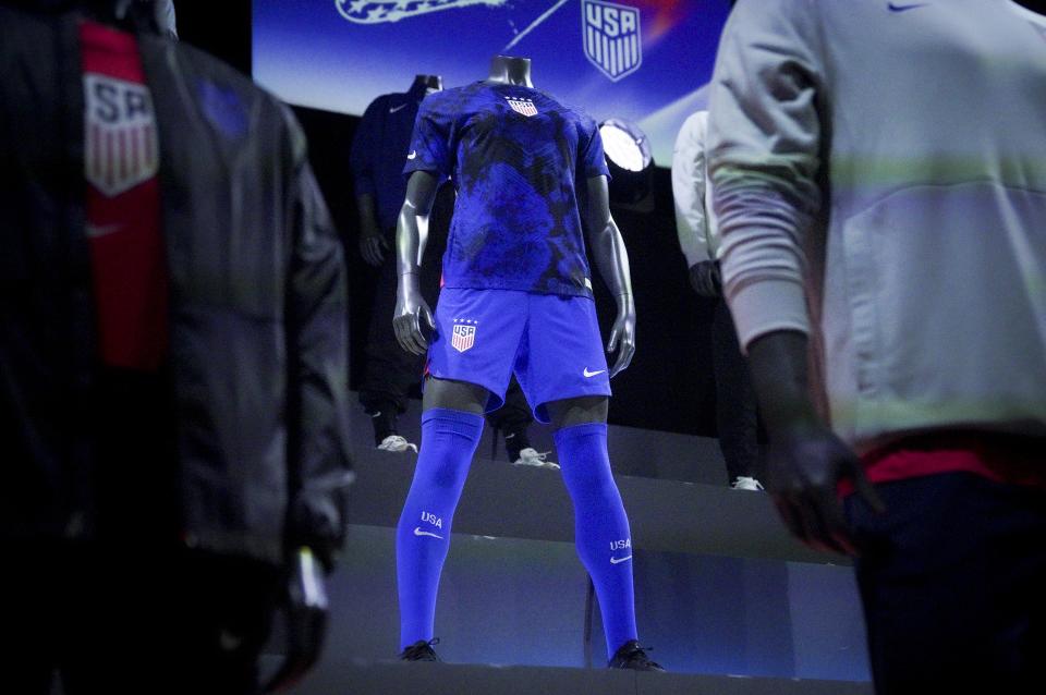 A new uniform, center, for the U.S. women's World Cup soccer tteam is displayed by Nike, Wednesday, Aug. 31, 2022, in New York. (AP Photo/Bebeto Matthews)