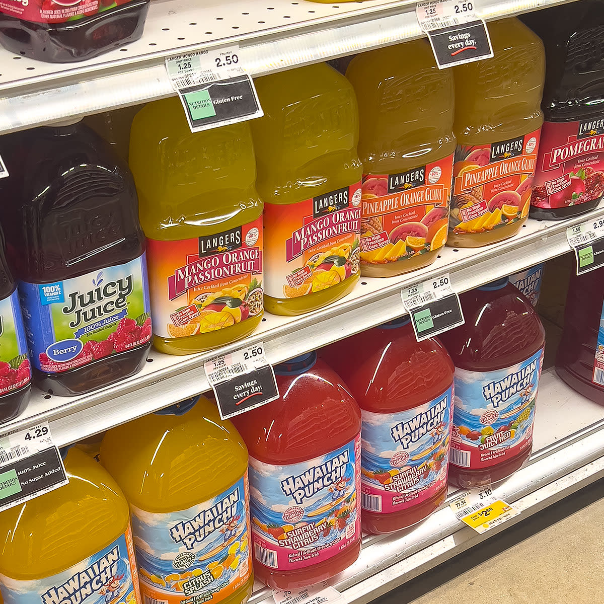 fruit juice bottles on shelves