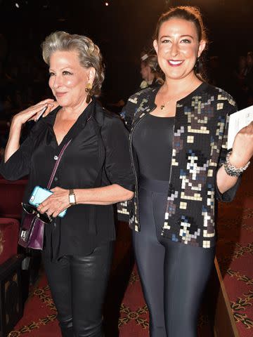 <p>Steve Eichner/WWD/Penske Media/Getty</p> Actress Bette Midler with her daughter Sophie von Haselberg walking together.