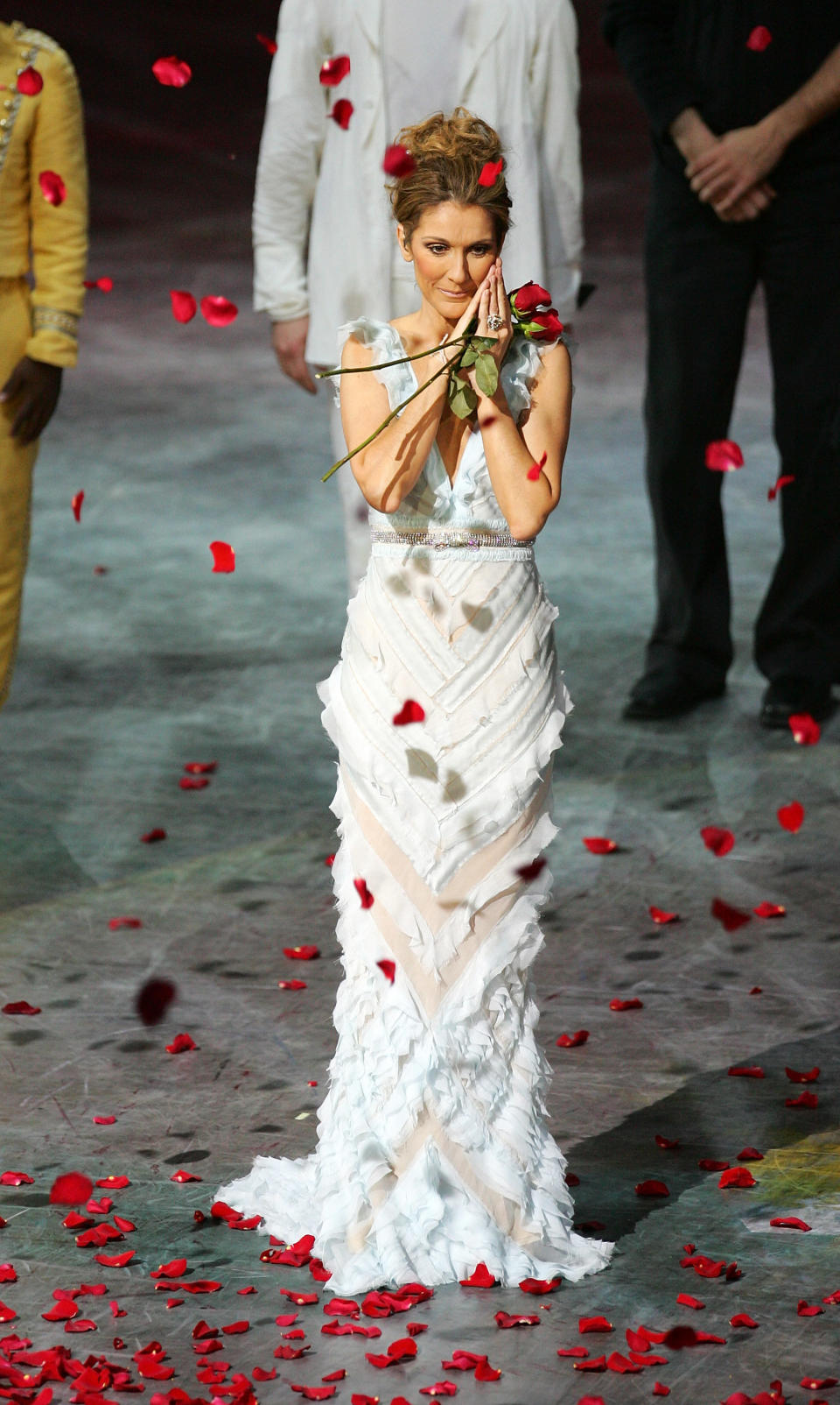 LAS VEGAS - DECEMBER 15:  Rose petals fall around singer Celine Dion after the last performance of her show 'A New Day...' at The Colosseum at Caesars Palace December 15, 2007 in Las Vegas, Nevada. Almost three million people watched Dion perform 717 shows since it opened in March 2003.  (Photo by Ethan Miller/Getty Images for AEG Live/Concerts West)