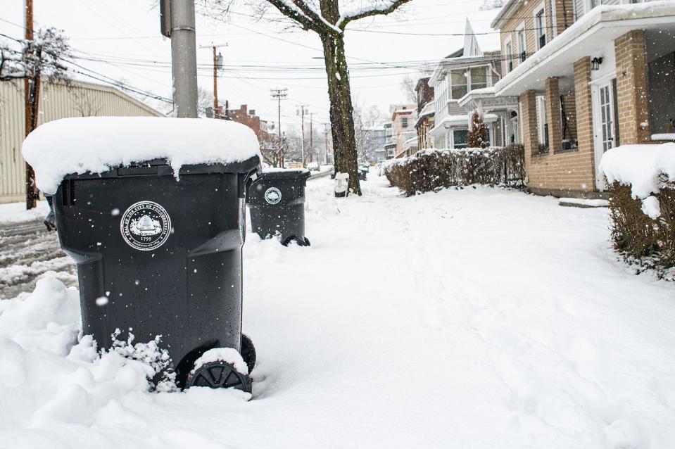 Snow piles on the sidewalk along Noxon Street in the city of Poughkeepsie, NY on Tuesday, March 14, 2023.