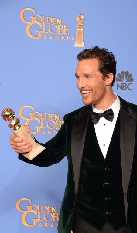 Actor Matthew McConaughey celebrates winning Best Actor in a Motion Picture - Drama for "Dallas Buyers Club" in the press room during the 71st Annual Golden Globe Awards in Beverly Hills, California, January 12, 2014