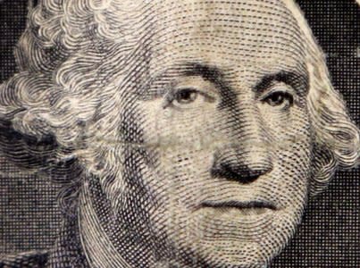 FILE PHOTO - The image of the first U.S. President George Washington on a dollar bill is seen in a photo illustration in Toronto October 15, 2014. REUTERS/Chris Helgren