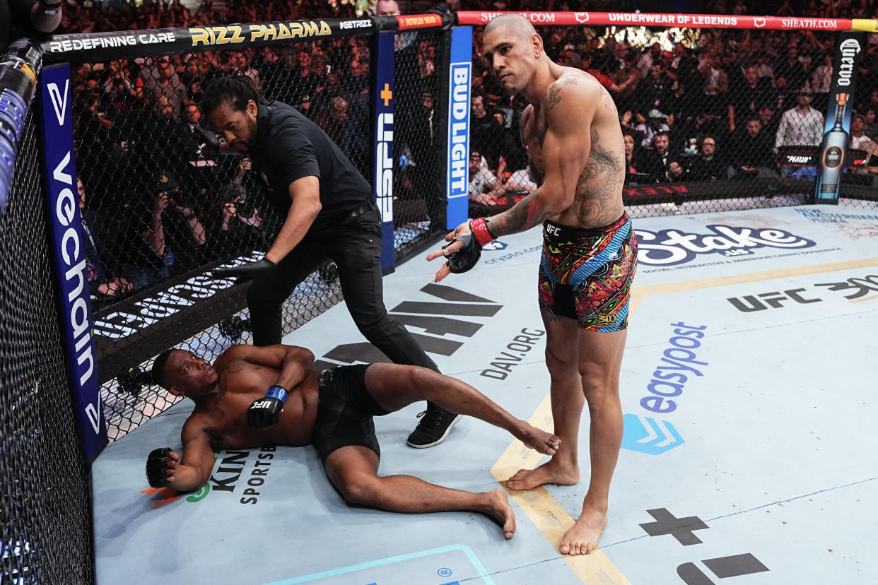 LAS VEGAS, NEVADA - APRIL 13: Alex Pereira of Brazil reacts to his knockout of Jamahal Hill in the UFC light heavyweight championship fight during the UFC 300 event at T-Mobile Arena on April 13, 2024 in Las Vegas, Nevada.  (Photo by Jeff Bottari/Zuffa LLC via Getty Images)