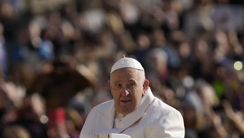 Pope Francis arrives for his weekly general audience in St. Peter’s Square, at the Vatican, Wednesday, March 29, 2023. Days before a viral image of him wearing a popular white Balenciaga puffer coat was created with AI, fooling many on the internet.