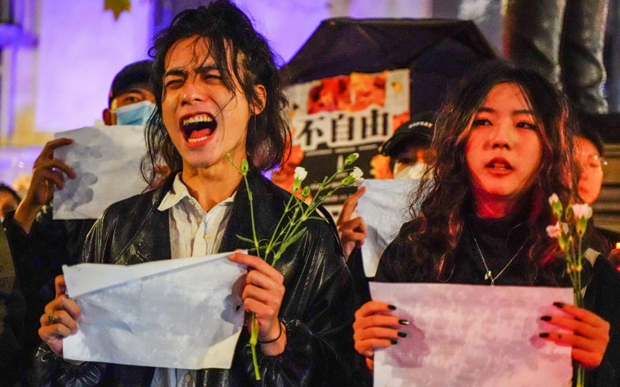 Hundreds of demonstrators gather outside the Chinese Embassy in London on Nov 27 - Alexander Mak/NurPhoto/Shutterstock